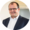 Markus Wittwer rund mit Hintergrund